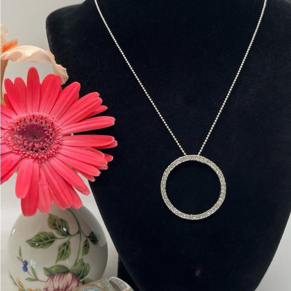 A Silver Tone Rhinestone Embellished Circle of Life Pendant Necklace